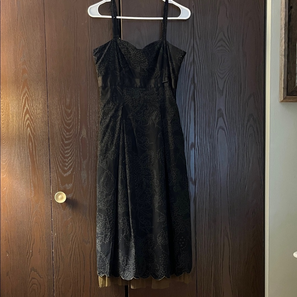 Didi strapped black eyelet dress lined in brown with netted bottom. XS